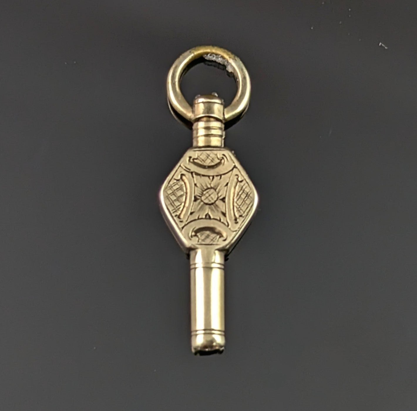 Tiny Antique Victorian 9ct gold cased watch key, floral engraved