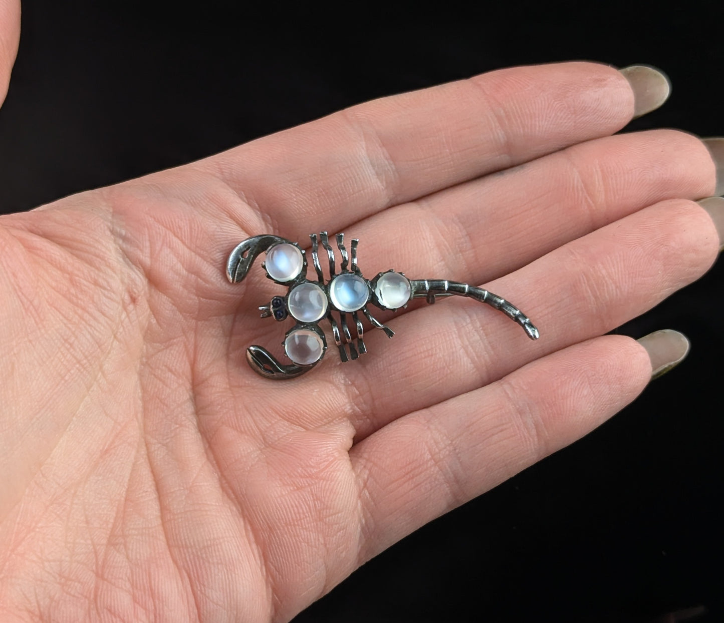 Antique Sterling silver and Moonstone scorpion brooch, blue paste eyes