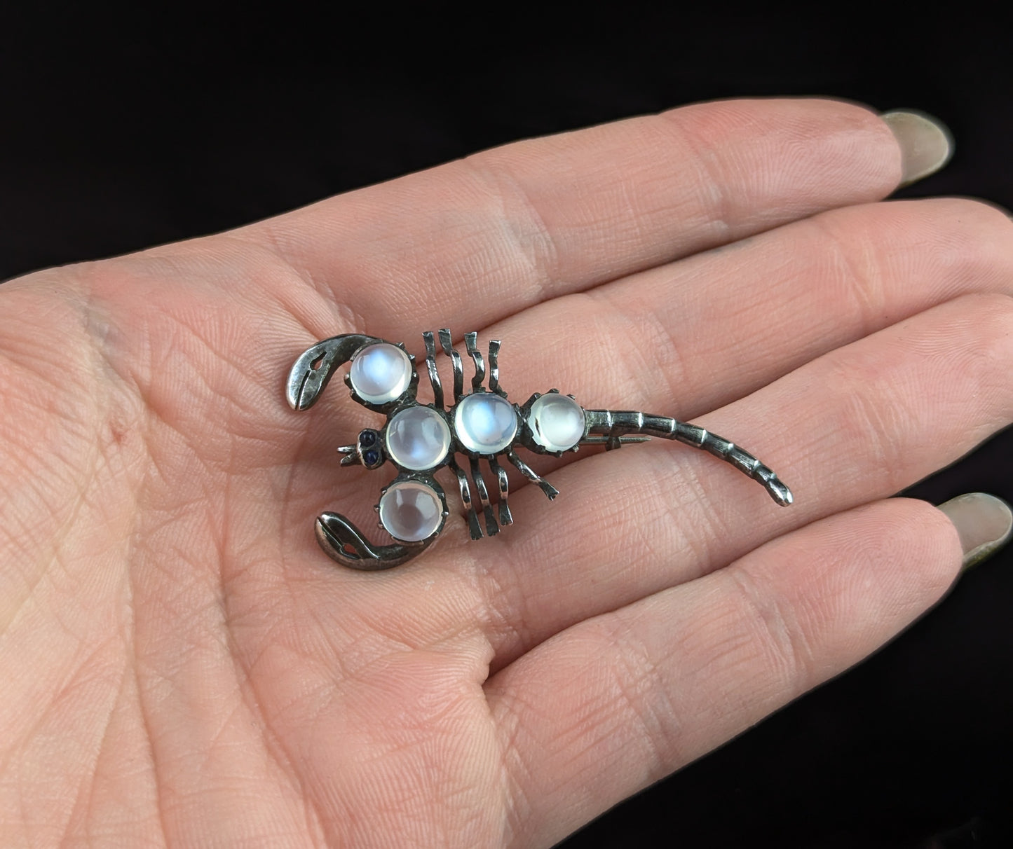 Antique Sterling silver and Moonstone scorpion brooch, blue paste eyes