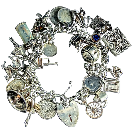Vintage sterling silver charm bracelet, heavy, loaded