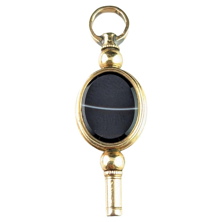 Antique 9ct gold cased watch key pendant, Banded agate