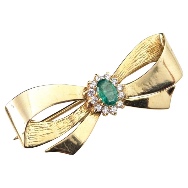 Vintage 9ct gold Emerald and Diamond bow brooch